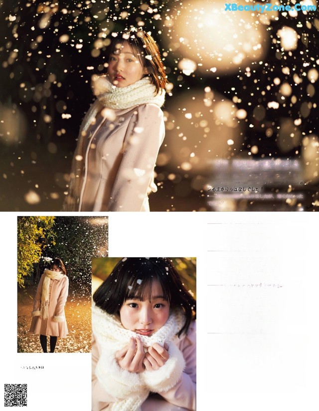 A woman in a pink coat and scarf standing in the snow.